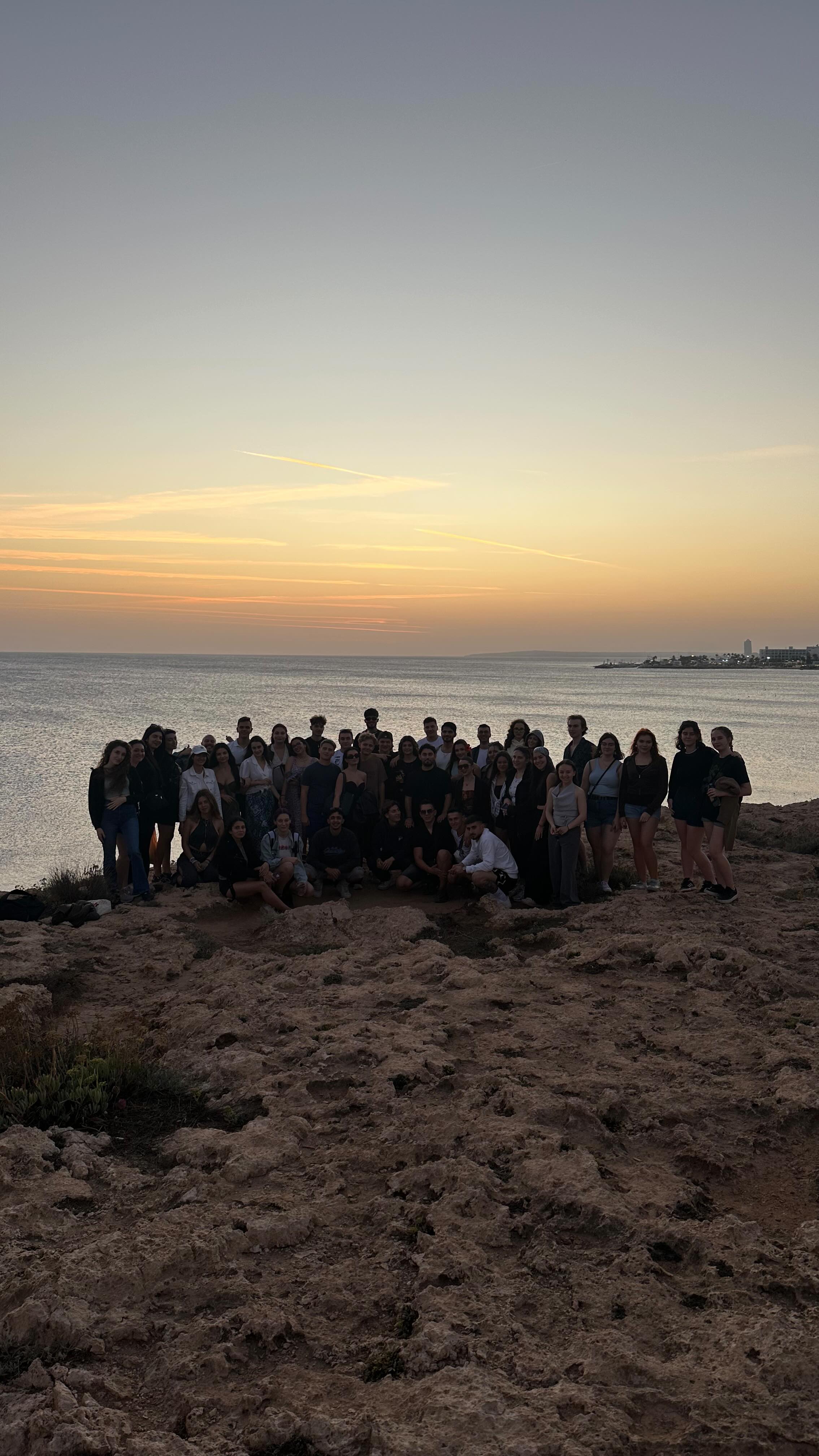 Erasmus+ youth exchange group at sunset