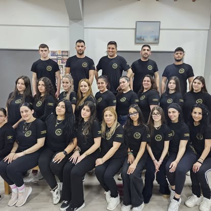 Achna Forest Culture Group members in association shirts