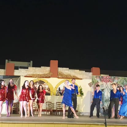 Cultural dance group photo from a performance